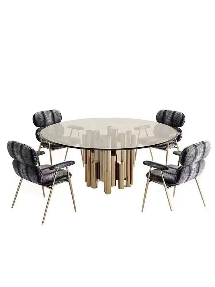 Round contemporary glass top table with polished brass legs and clear tempered glass surface. Round contemporary glass top table with polished brass legs and clear tempered glass surface.